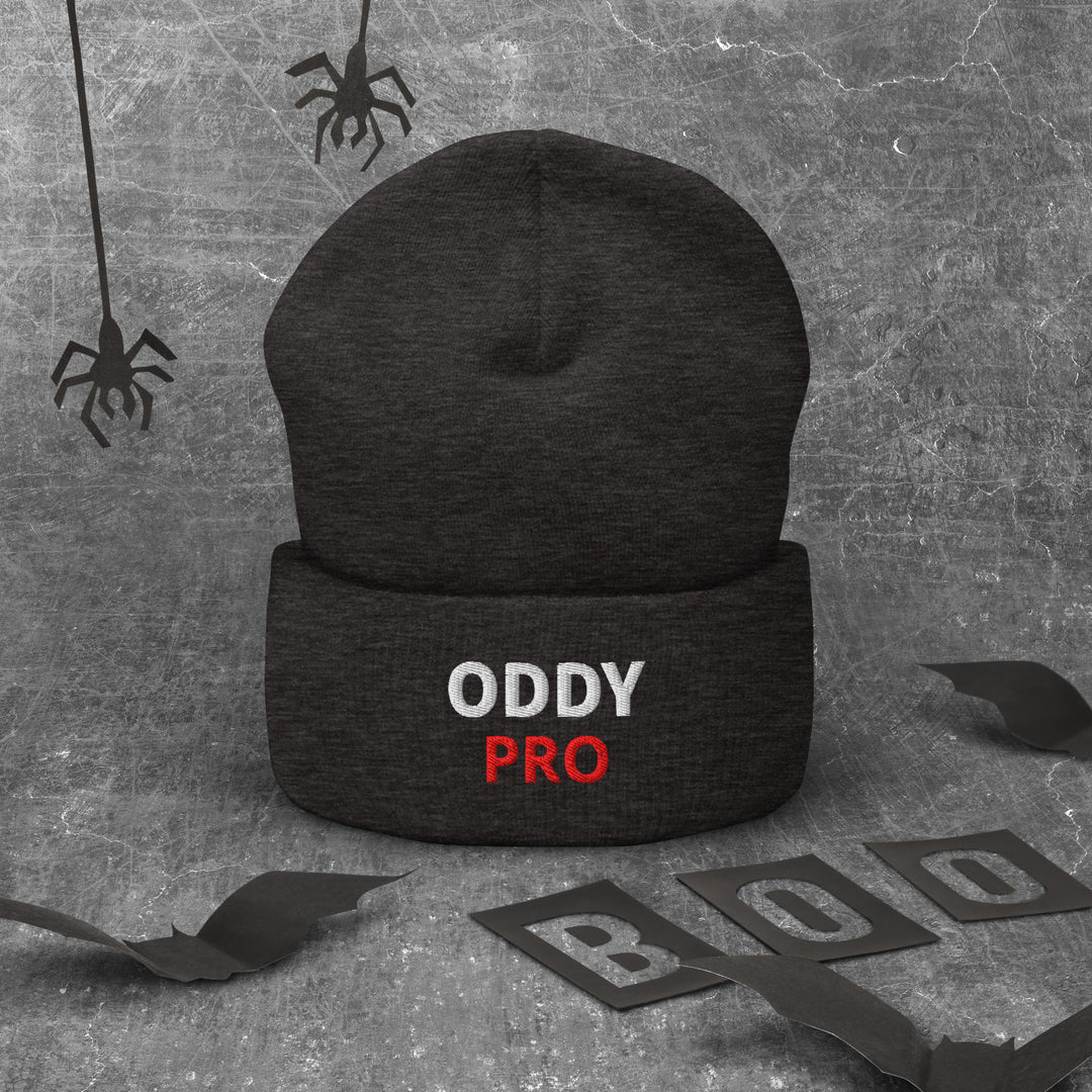Oddy Pro cuffed beanie in black, showcasing embroidered logo, ideal for stylish warmth and comfort.