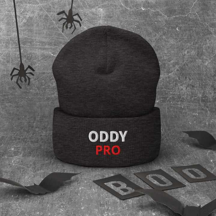 Oddy Pro cuffed beanie in black, showcasing embroidered logo, ideal for stylish warmth and comfort.