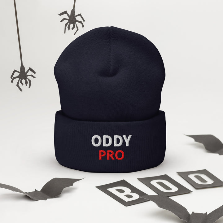 Oddy Pro cuffed beanie displayed with Halloween-themed decorations.