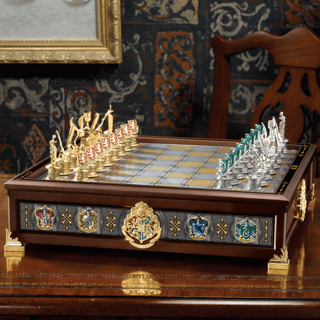 Quidditch Chess Set featuring intricately detailed board and gold and silver plated pieces representing Hogwarts houses.