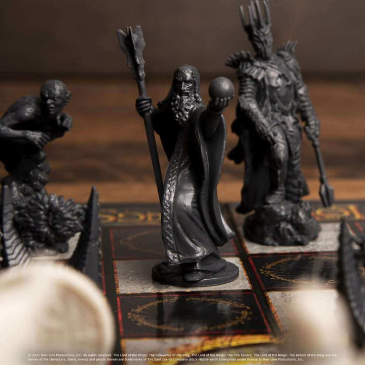 The Lord of the Rings - Battle For Middle Earth Chess Set with iconic black plastic pieces on the board.