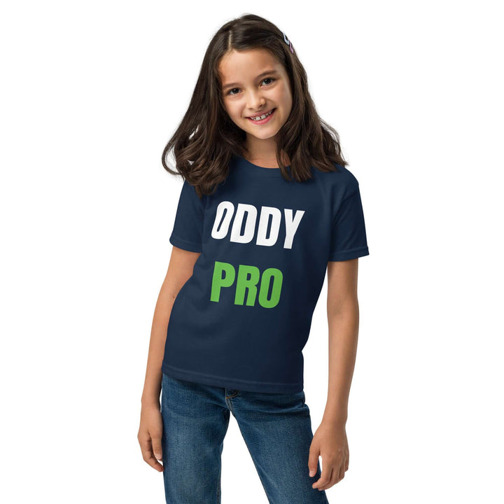 Youth moisture-wicking t-shirt modeled by a girl wearing a navy Oddy Pro shirt, showcasing comfort and style.